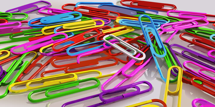 Colorful paperclips scattered randomly on a white background, showcasing a variety of bright hues and overlapping arrangements.