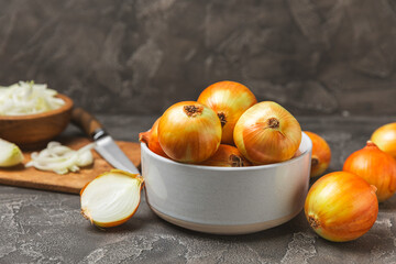 Onion on the kitchen table. onion slice. onion rings. Fresh Yellow Onion. Natural, fresh, vegetarian food. Agricultural products. Healthy eating. Vegetables. Farmer's market. Space for text.Copy space