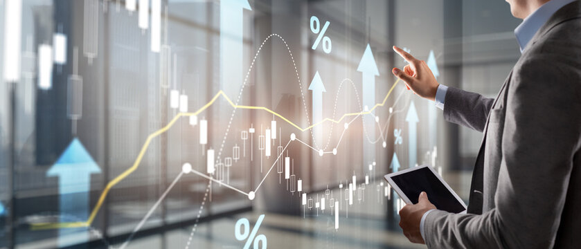 Growing charts against the backdrop of the city. Business chart and reflection buildings - Powered by Adobe