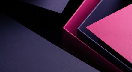 Abstract geometric background with overlapping pink and dark purple paper layers creating a modern design.