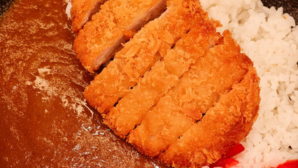 Curry rice with tonkatsu cutlet. Japanese food.