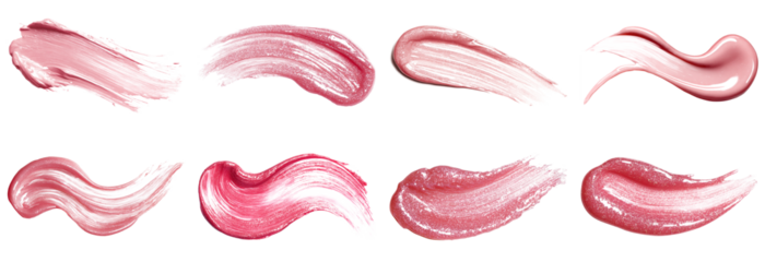 A collection of pink lip gloss smears isolated on a white background, showcasing various textures and shades perfect for beauty and cosmetic marketing.