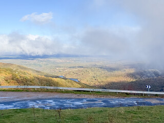 Obraz premium Hayedo de la Pedrosa natural protected area, beech forest autumn season with fog 