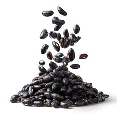 Obraz premium Black Turtle Beans Falling from a Pile Isolated on Transparent Background