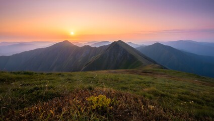 Serene mountain peaks bathed in golden sunrise light