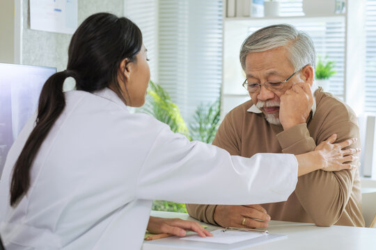 Doctor and senior patient in emotional health care counseling after diagnosis in hospital support setting - Powered by Adobe