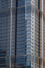 Obraz premium Windows of Modern Office Building. Glass building skyscraper texture in Shanghai, China