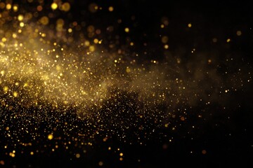 Abstract gold particles on black background