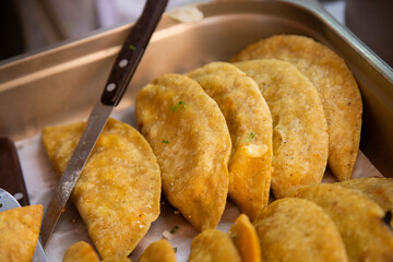 Street food stand serving fried tamales, gorditas and empanadas in Mexico City.
