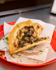 Street food stand serving fried tamales, gorditas and empanadas in Mexico City.