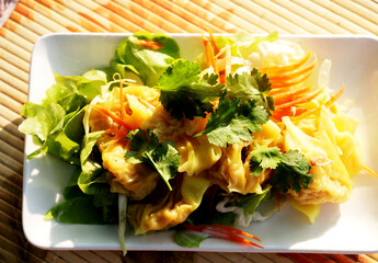 Gyoza or Shumai - Soy Sauce - Chinese food is fresh and ready to be served, it is popular in Asia and the warm morning sunshine makes it even more appetizing.