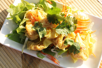 Gyoza or Shumai - Soy Sauce - Chinese food is fresh and ready to be served, it is popular in Asia and the warm morning sunshine makes it even more appetizing.