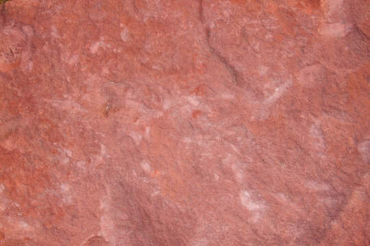 Red stone wall texture with rough vintage surface