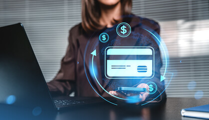 Woman using phone for online credit card transaction with digital overlay.