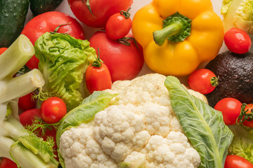 Vibrant harvest array, cauliflower's frothy florets dance beside verdant lettuce, evoking bountiful Lammas feasts and elusive Mabon whispers