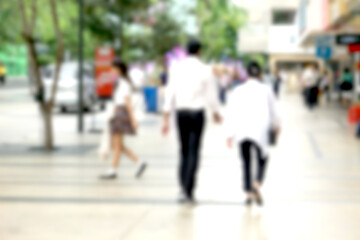31 July 2023: Bangkok Thailand. "The busy city crowd moved to the pedestrian walkway on the business traffic road and other soft blured background for text.