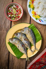 Fried mackerel with thai spicy chilli fish sauceand rice