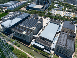 Aerial view of solar panels installed on building rooftop