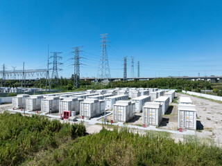 Aerial view of battery energy storage systems under a clear blue sky