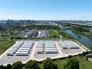 Aerial view of battery energy storage systems under a clear blue sky