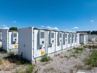 Aerial view of battery energy storage systems under a clear blue sky