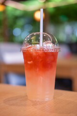 Tropical drink lychee juice on the wooden table