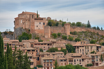 Fototapeta premium The medieval village of Alquezar, in the province of Huesca, with its clay roofs and its castle on the hilltop.