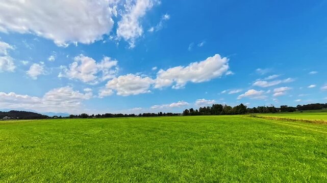 4K Timelapse alpine video with moving clouds near Grabenstaett, Lake Chiemsee, Traunstein, Chiemgau, Bavaria, Germany