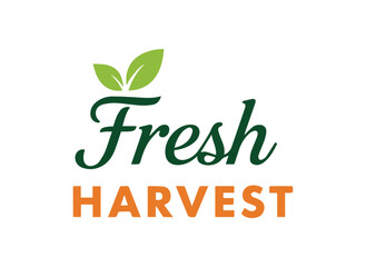 Fototapeta premium Fresh harvest logo with green leaves and orange text