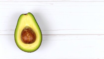 Perfectly Ripe Avocado Half, a Minimalist Still Life on a White Planked Table