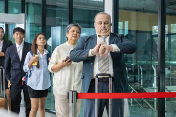 Frustrated airline passengers waiting in queue