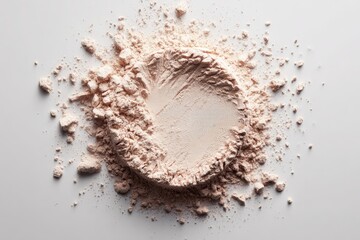 Light peach powder, scattered around a hollowed center