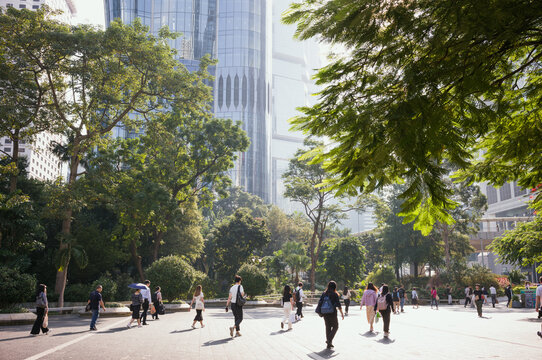 People walking through a urban park, Central, Hong Kong