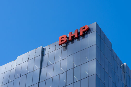Melbourne, Victoria, Australia - August 30, 2025: Close up of BHP sign on the office building in Melbourne, Victoria, Australia. BHP Group is an Australian multinational mining and metals corporation.