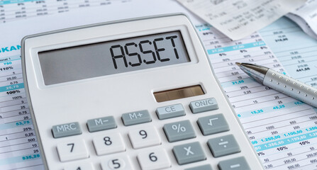A calculator with the word Asset on the display