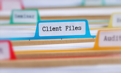 File folders with a tab labeled Client files
