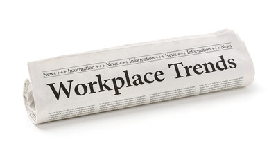 Rolled newspaper with the headline Workplace Trends