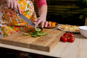Fresh and Vibrant Ingredients Slicing Fresh Cucumbers in a Bright and Cheerful Kitchen