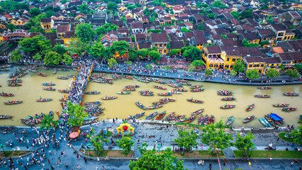 Fototapeta premium Aerial view of Hoi An ancient town, Vietnam at dusk or night, this place is a UNESCO world heritage site. Hoi An is one of the most popular destinations in Vietnam
