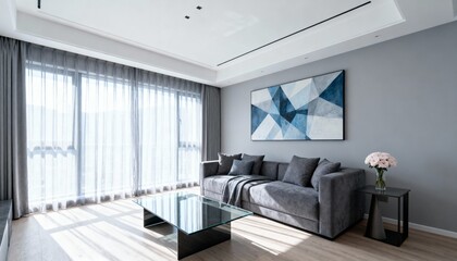 Modern living room interior design featuring gray sofa, abstract art, and natural light from a window