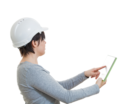 Side view woman engineer wearing protective white helmet, using tablet gadget for work. Solving problems with the help of modern technology. Female architect isolated on transparent background