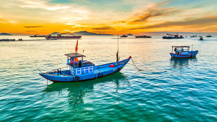 Fishing boats off the coast of Cua Dai, Hoi An, Vietnam at dawn. The main means of offshore fishing...