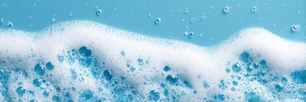 Light blue soapy foam with bubbles