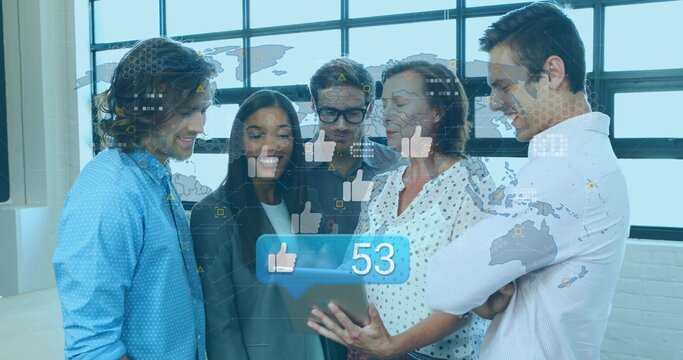 Reviewing tablet at office meeting with glass world map wall, thumbs-up icons and alert showing 53 - Powered by Adobe