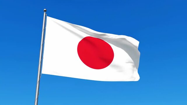 Japanese flag waving majestically against a clear blue sky