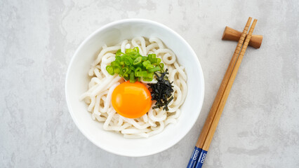 Udon Noodles with egg yolk and dashi soup, japanese food
