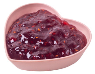 Isolated raspberry jam in a heart shaped rosette on a white background, side view
