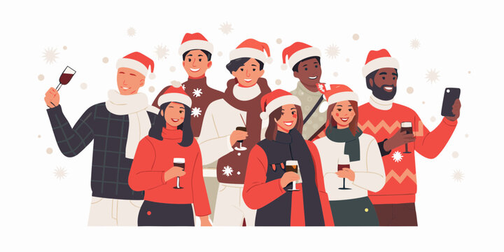 Diverse group of friends wearing santa hats and festive sweaters celebrating a holiday party together