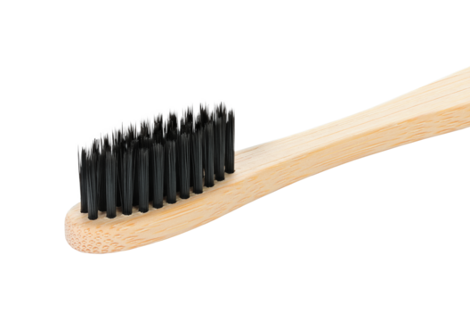 Bamboo toothbrush, isolated on transparent background, full focus for sharp detail. Eco oral care accessory, sustainable hygiene tool for daily dental cleaning routine