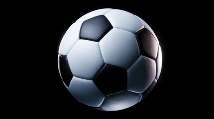 Fototapeta premium Classic Soccer Ball Isolated on Black Background, Emphasizing Texture and Detail for Sports and Design